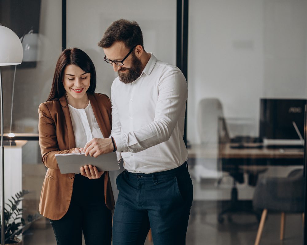 Two business partners working in office